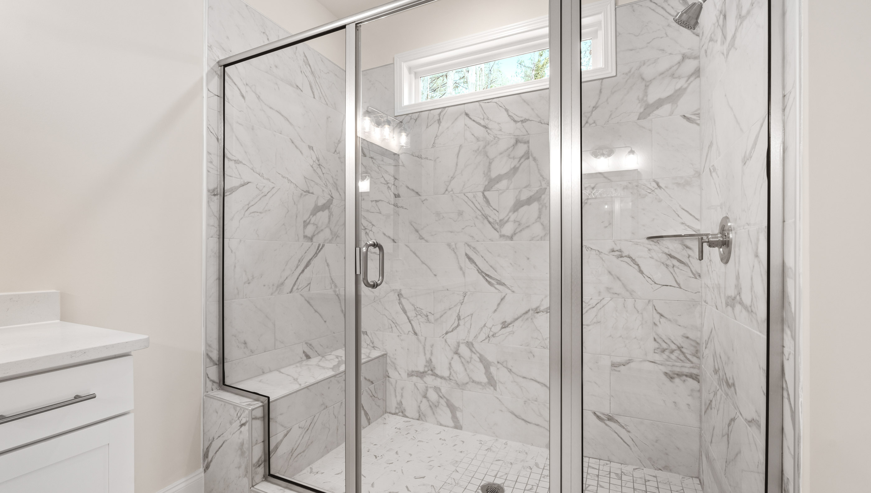 Primary bathroom with double vanity sinks.