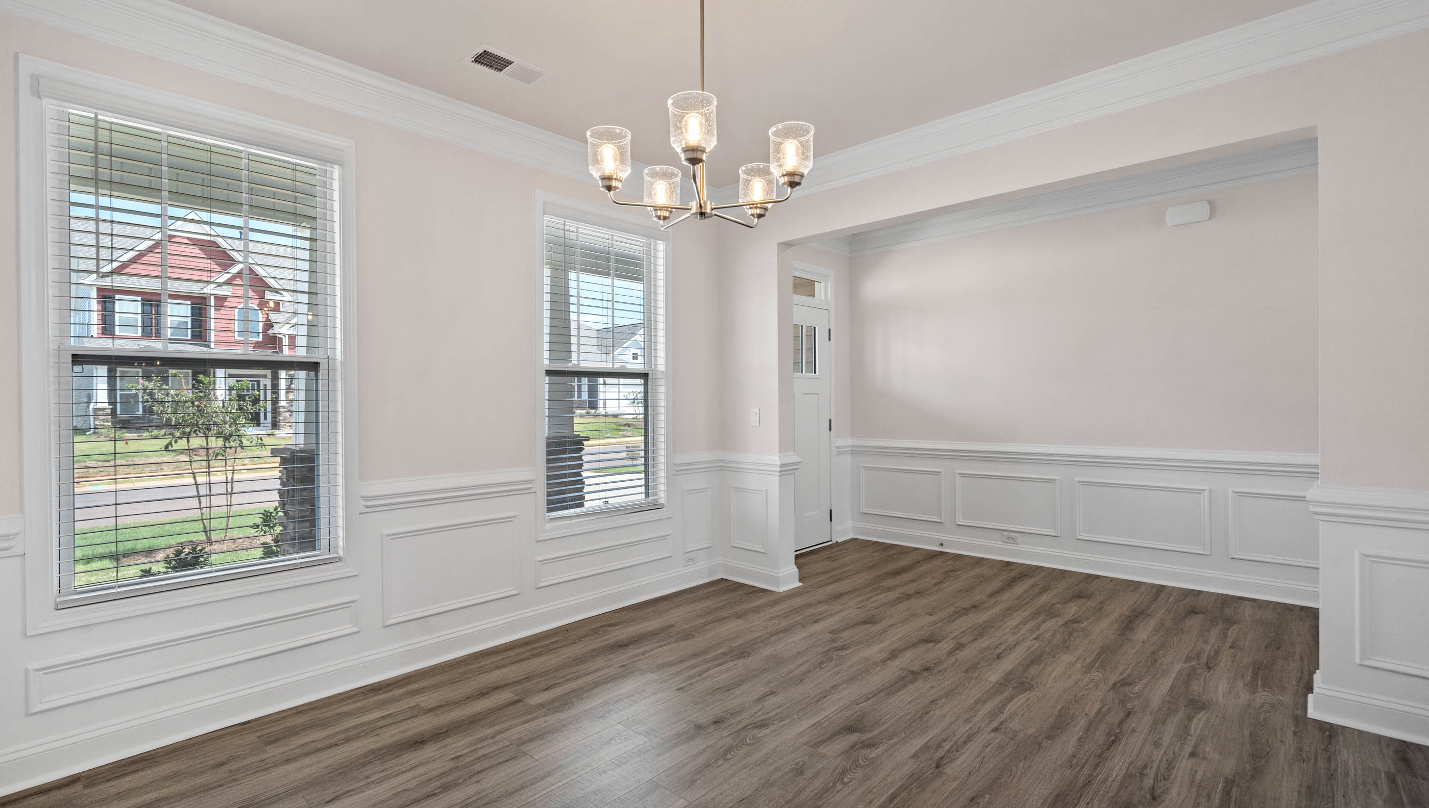 View of dining room with large window providing lots of natural light.
