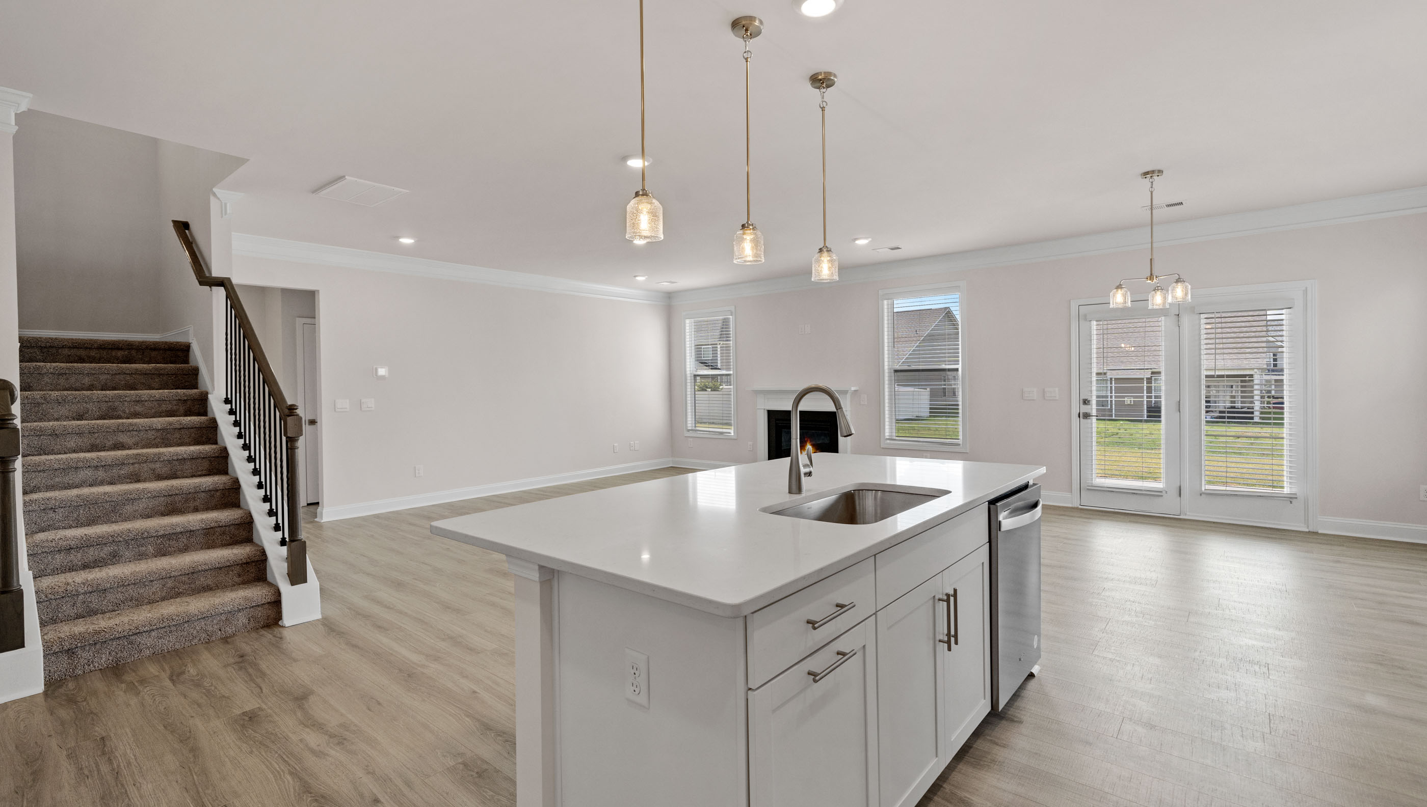 View from kitchen of the family and breakfast rooms.