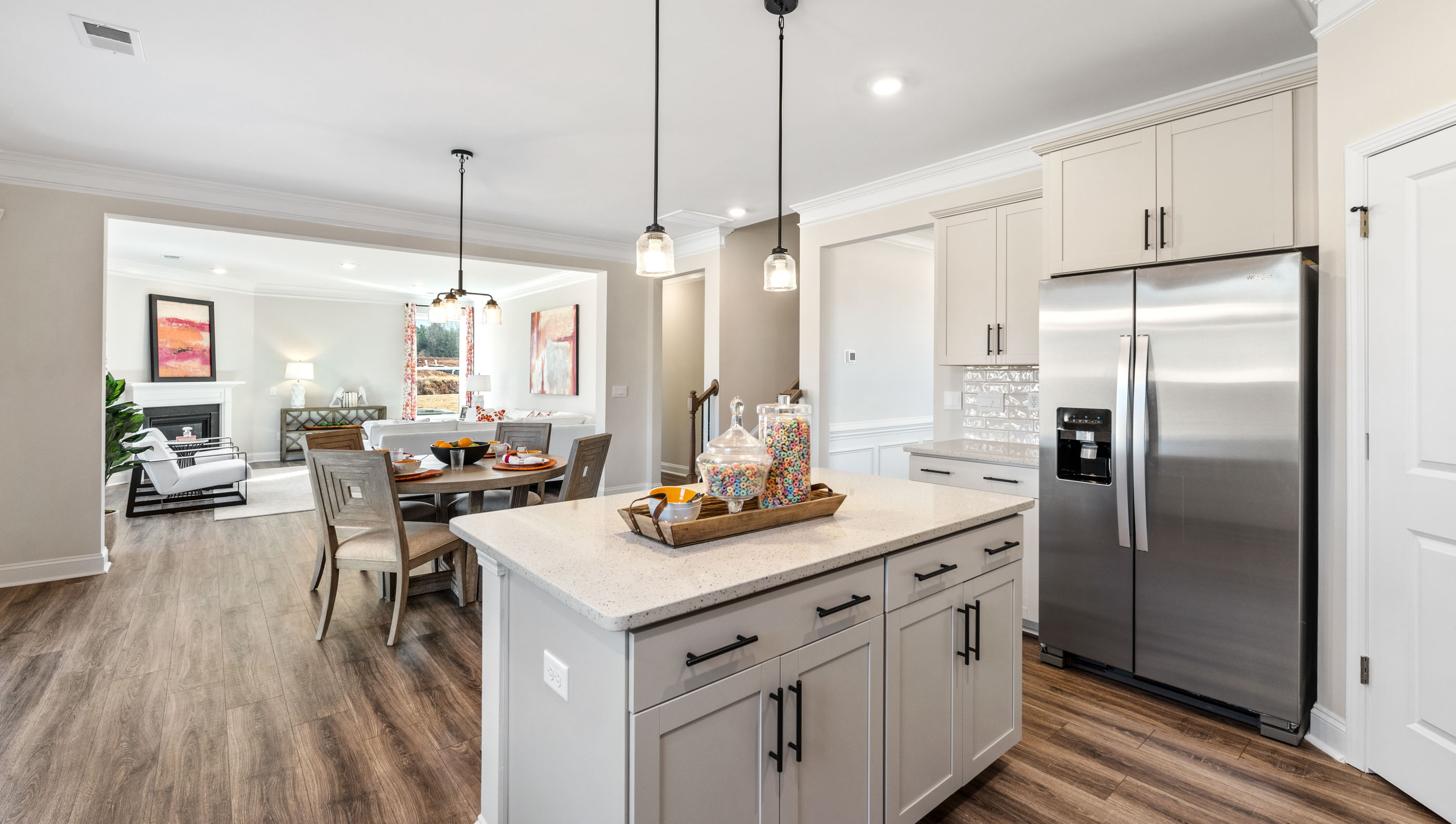 Kitchen with island and cabinets.