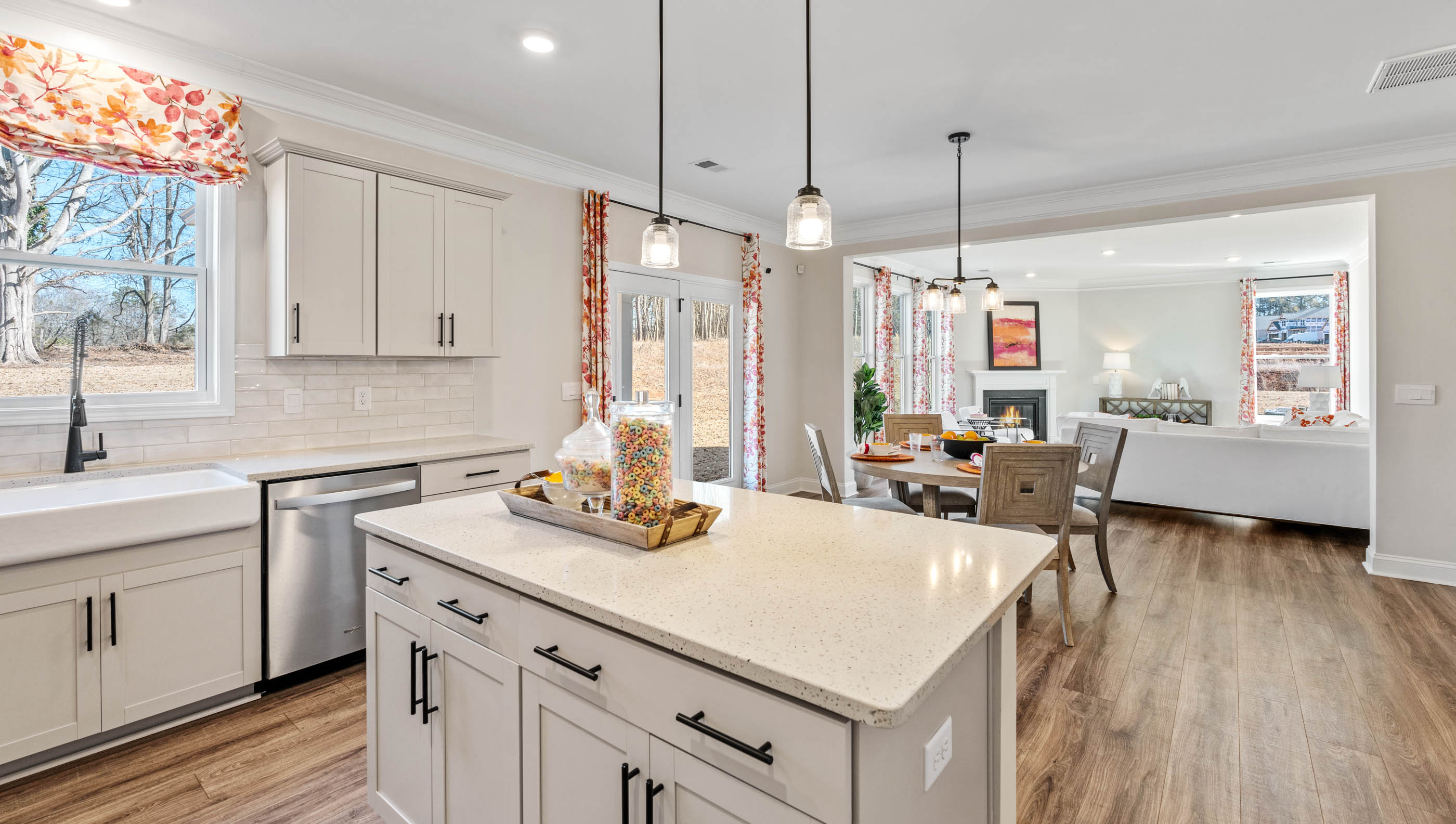Kitchen with island and cabinets.