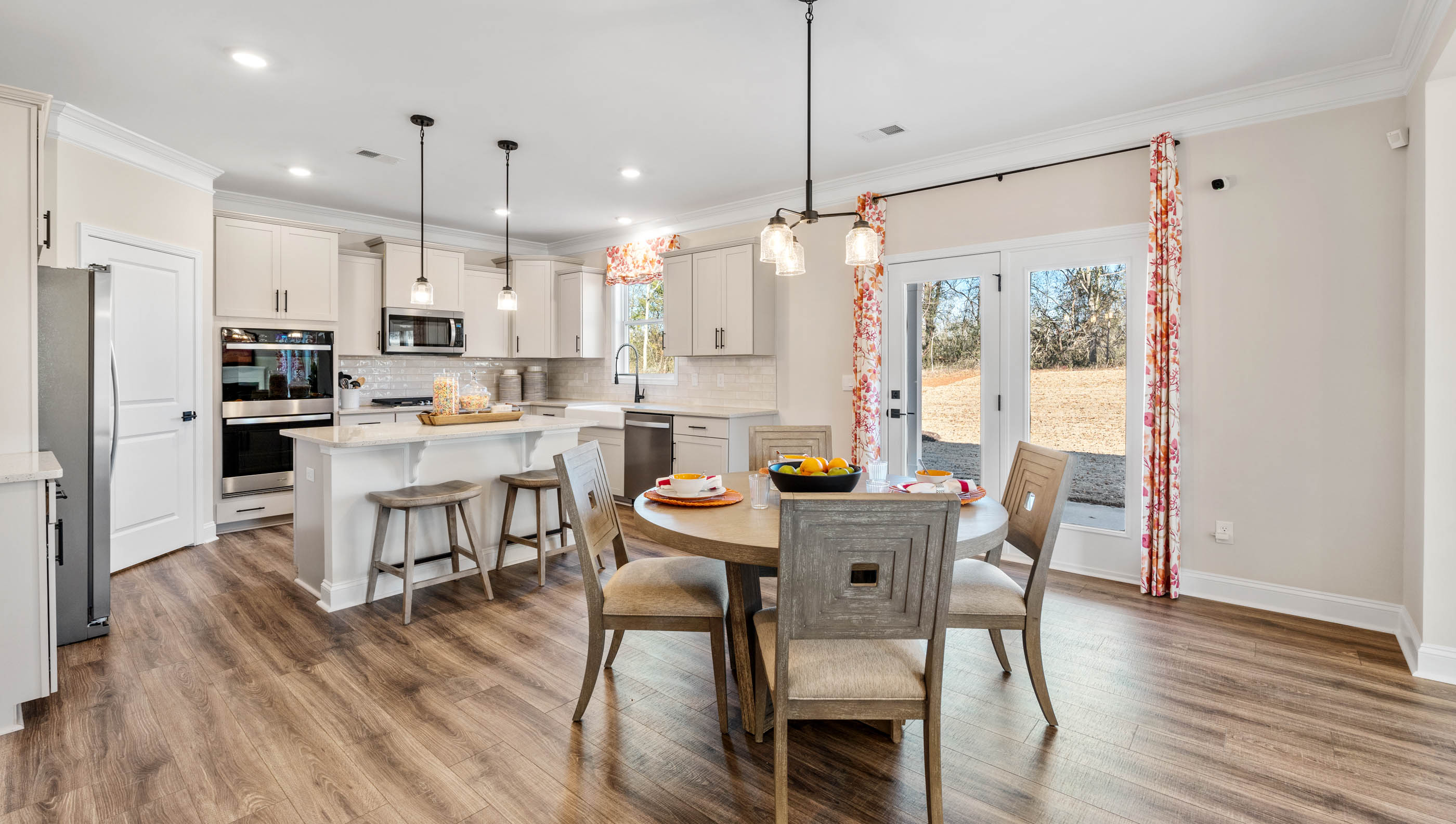 Kitchen with island and cabinets.