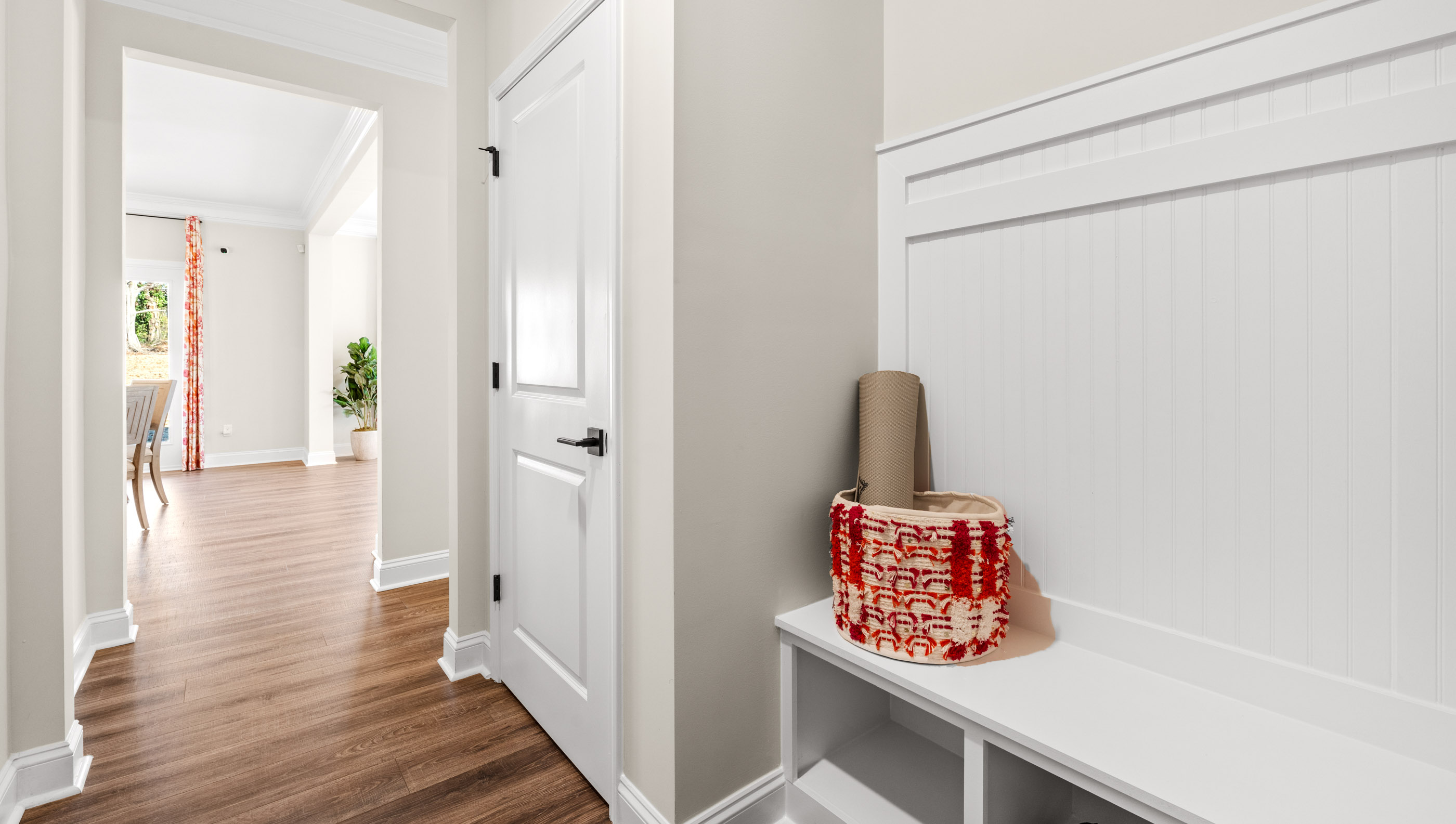 Hallway area with storage.