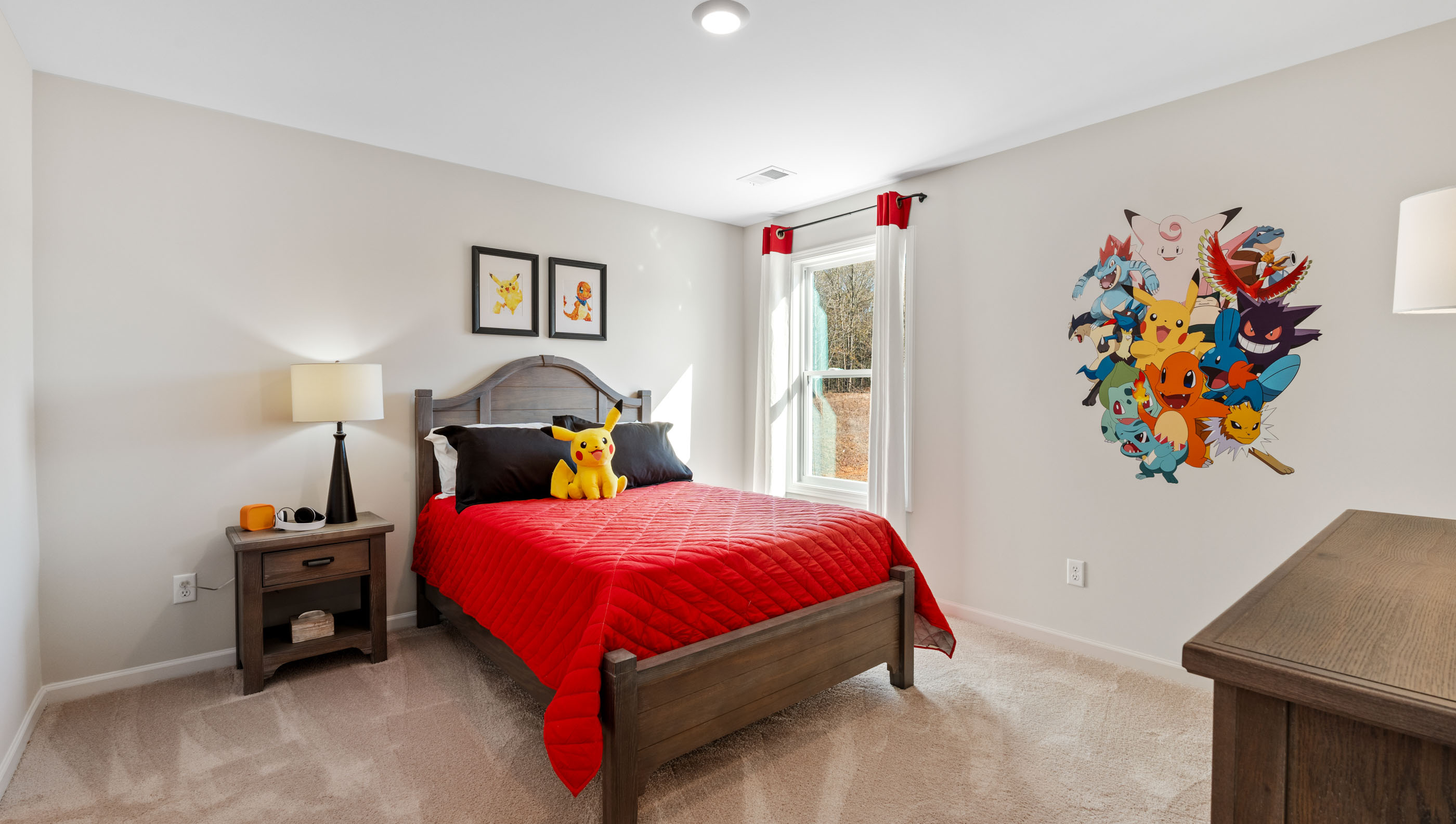 Bedroom with window and carpet.