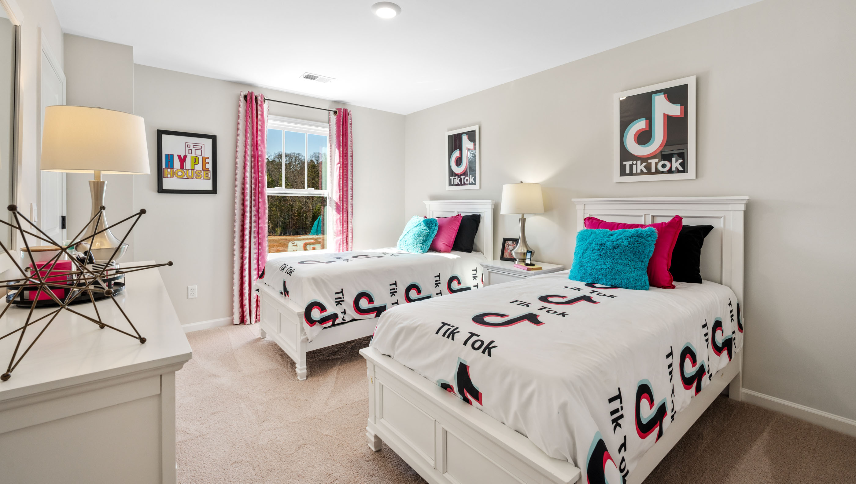 Bedroom with window and carpet.