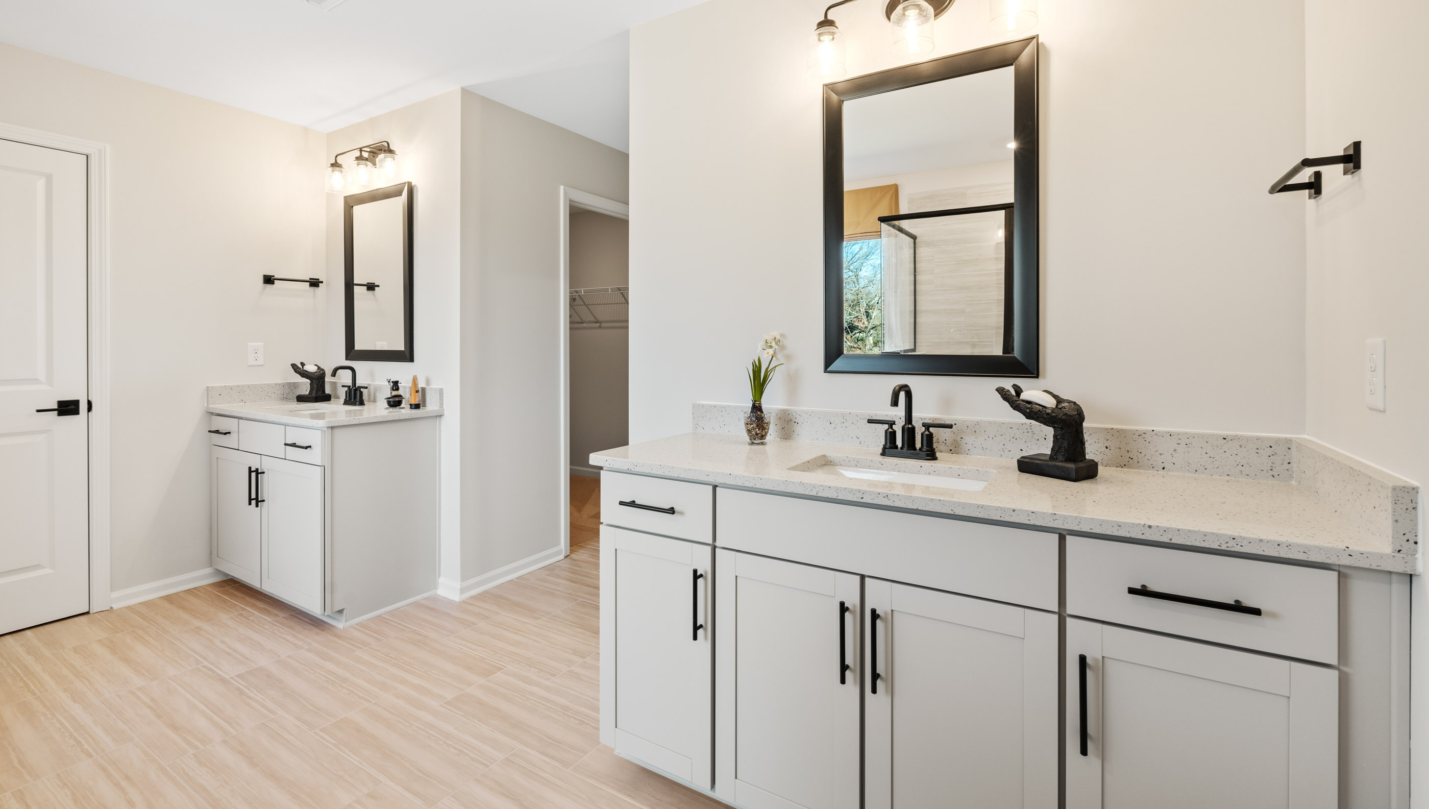 Primary bathroom with double vanity sink.