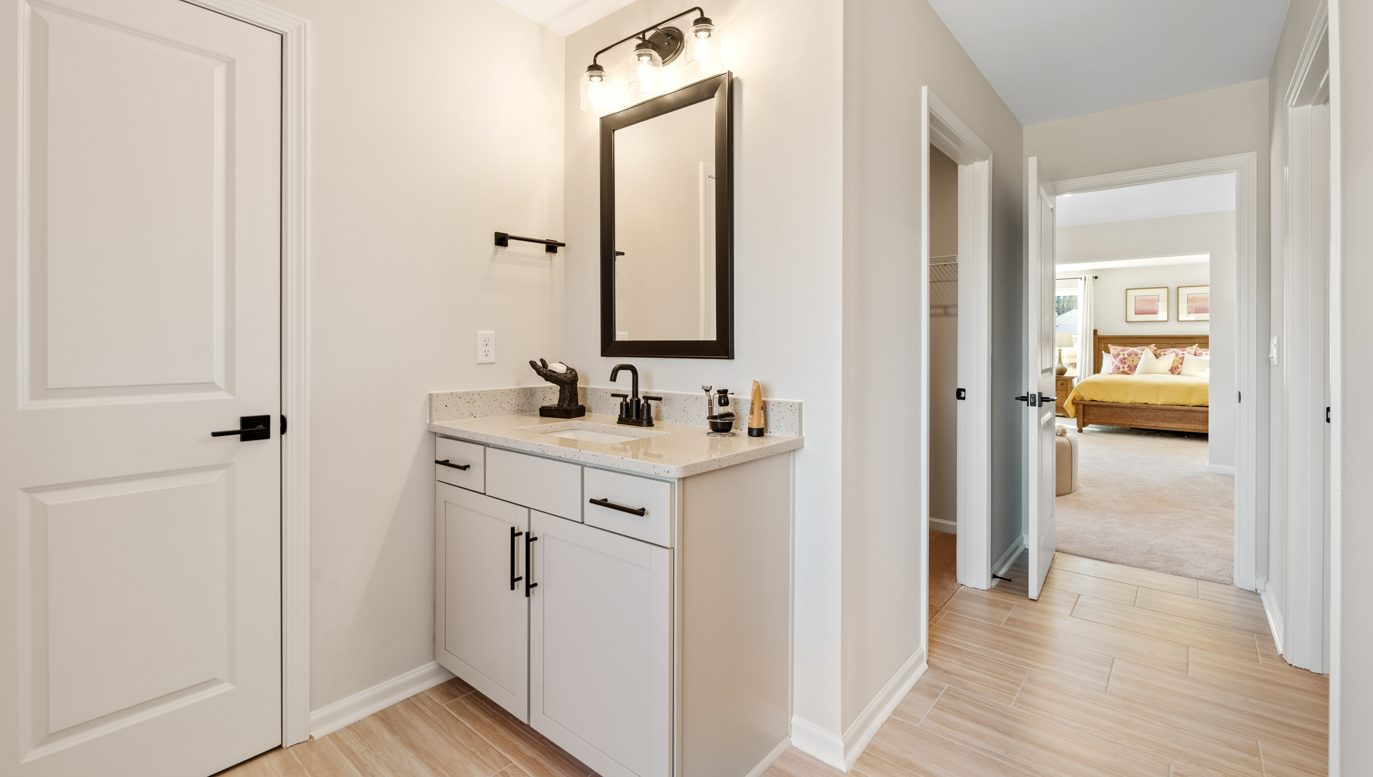 Primary bathroom with double vanity sink.