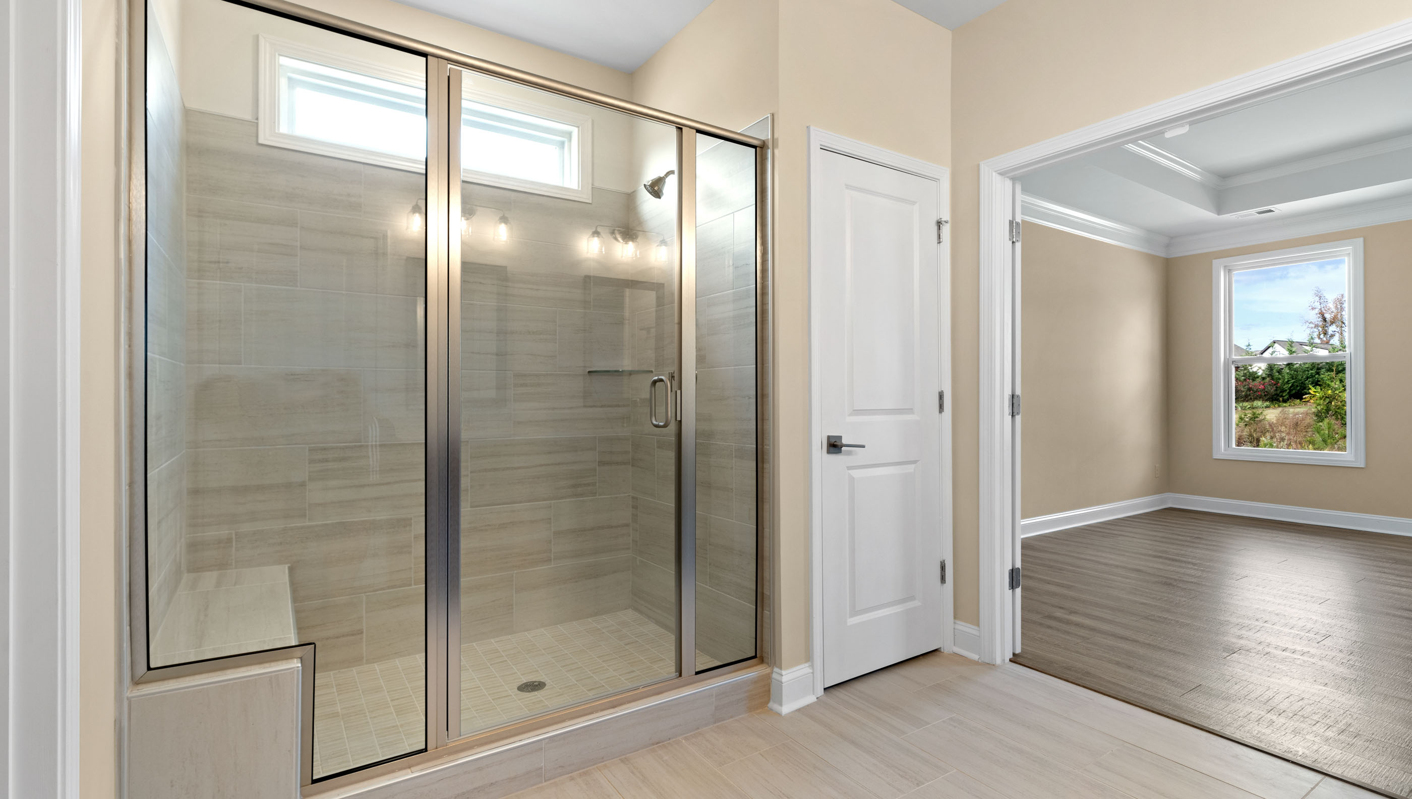 Primary bathroom with luxury oversized walk-in shower.