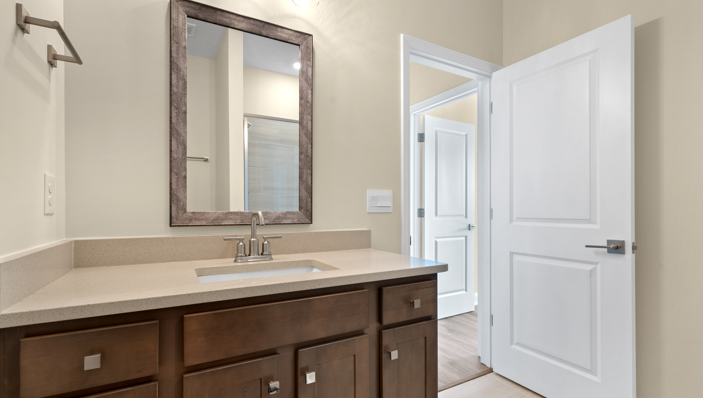 Hall bathroom with vanity.