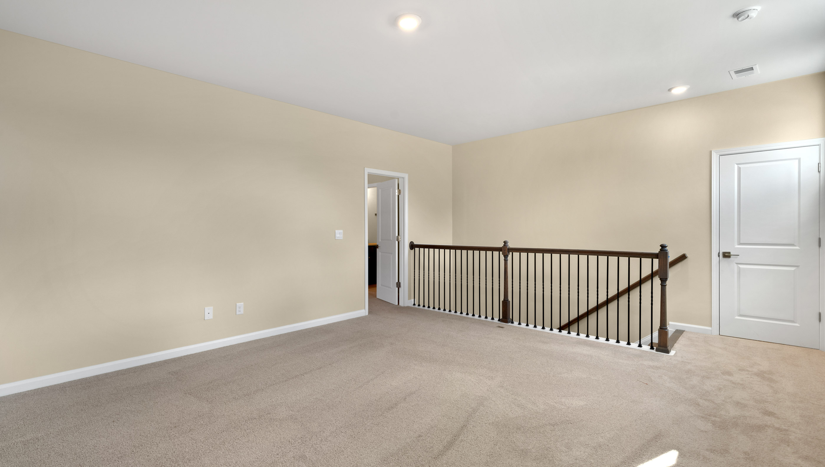 Upper level landing and loft area.