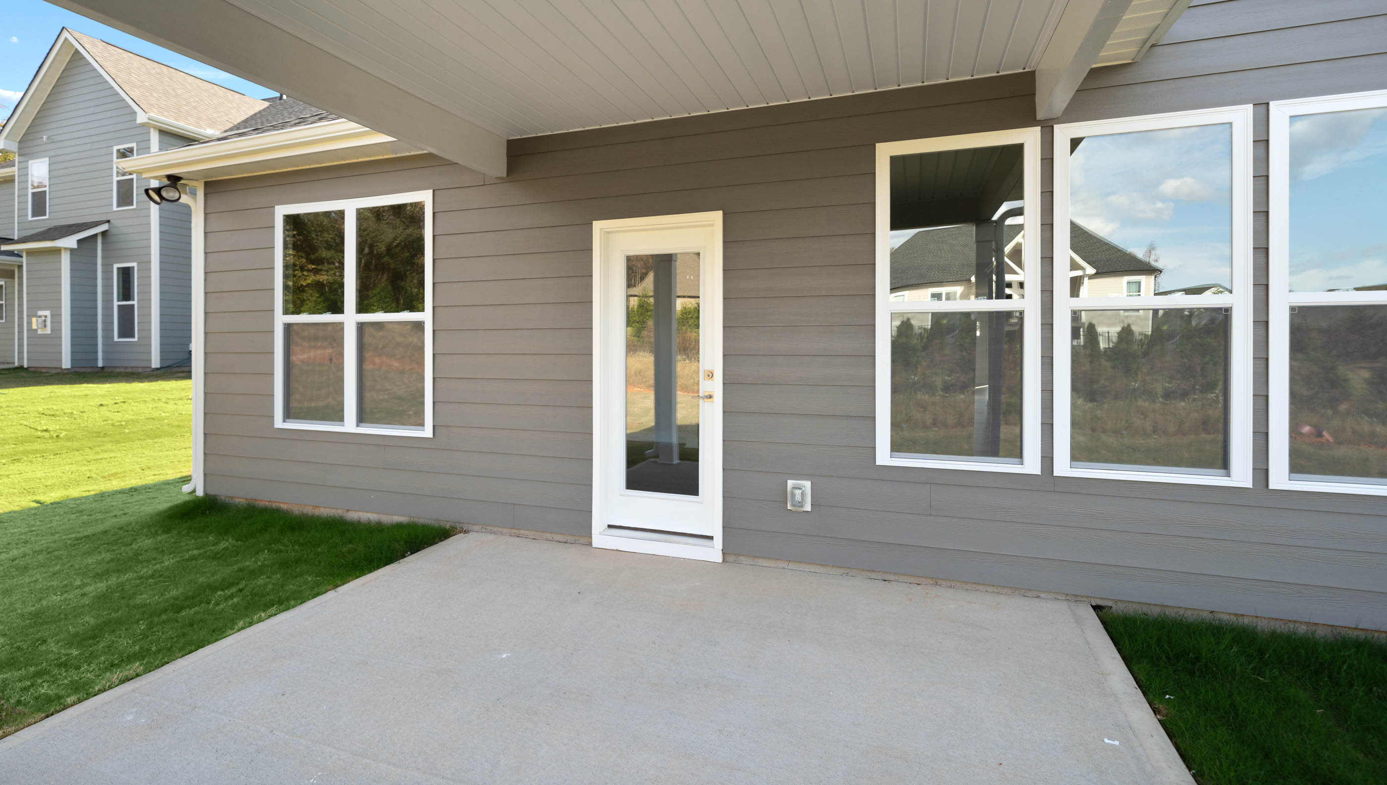 Covered porch overlooking the back yard.