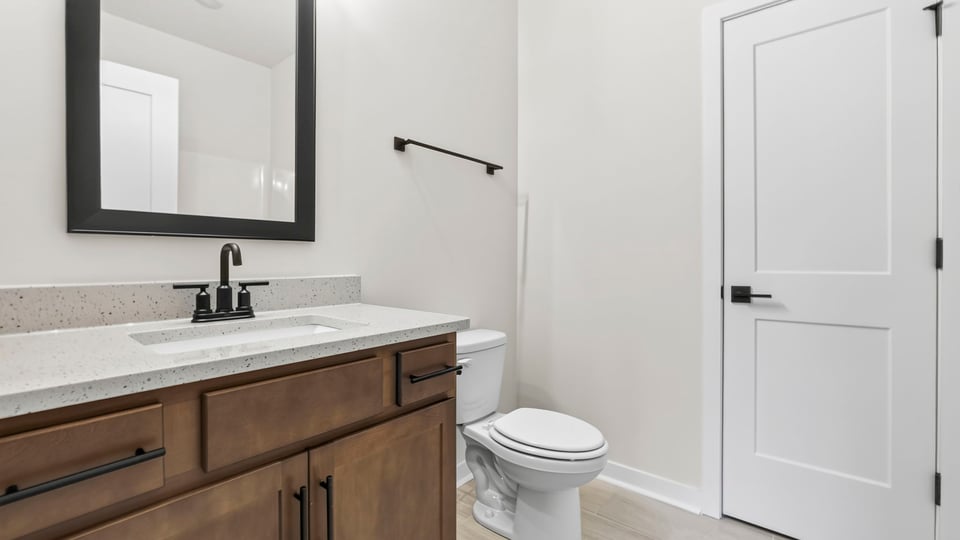 Bathroom with single vanity sink.