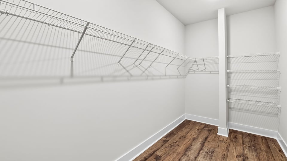 Closet with hanging storage racks.