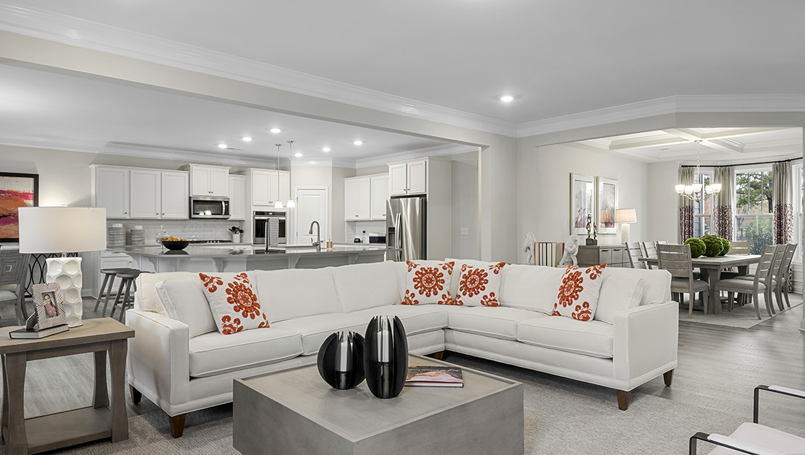 Living area with fireplace and windows.