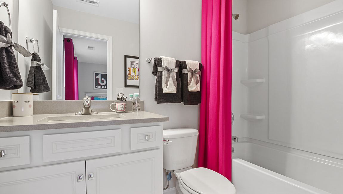 Bathroom with vanity sink.