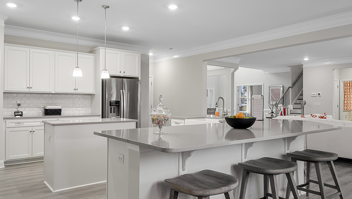 Kitchen with island and cabinets.