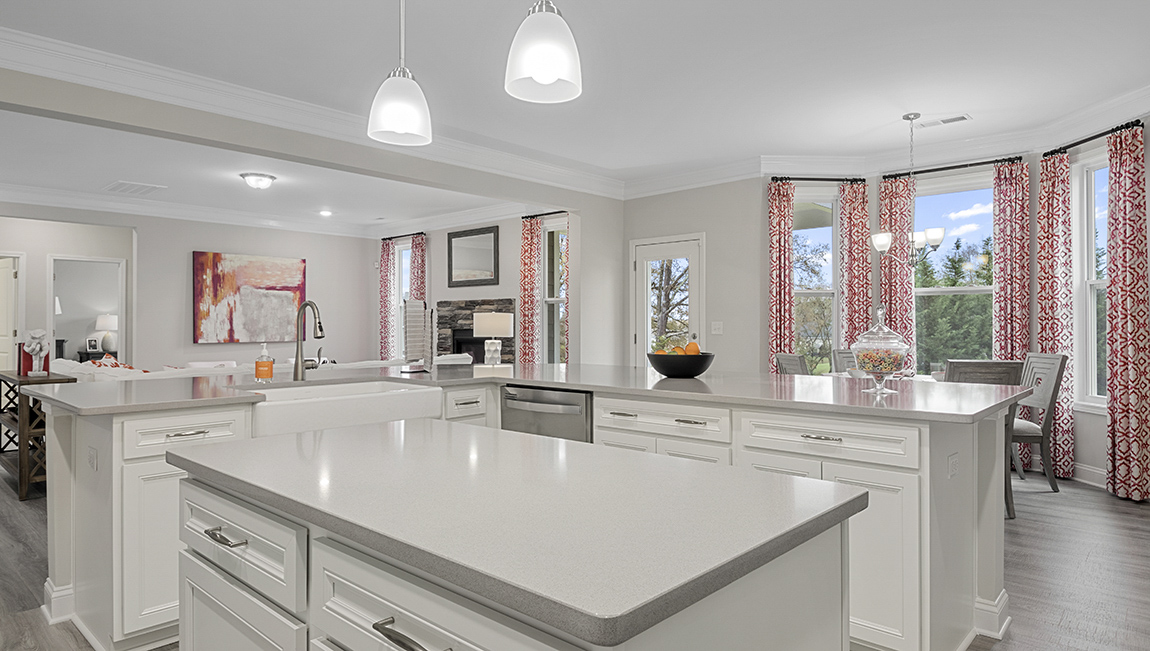 Kitchen with island and cabinets.