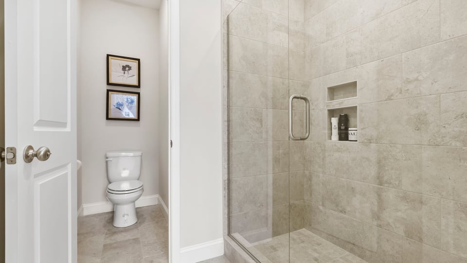 Primary bathroom with double vanity sink.