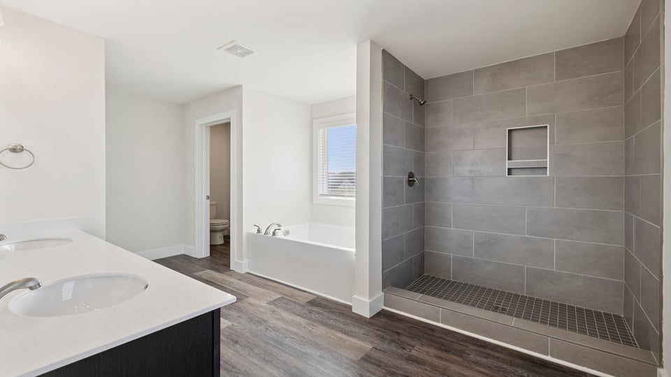 Primary bathroom with vanity sink.