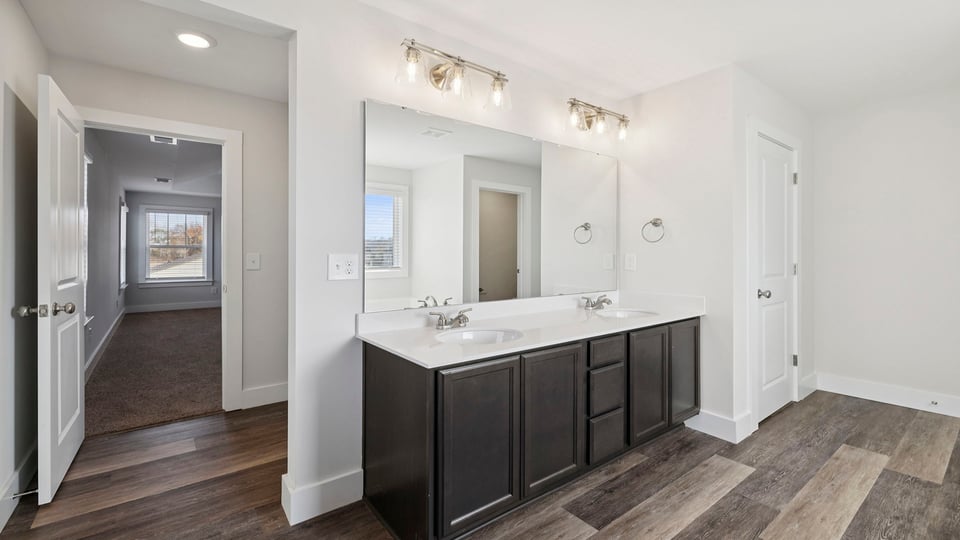 Primary bathroom with vanity sink.