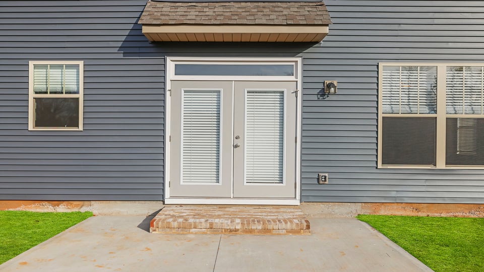 Back exterior with doors.