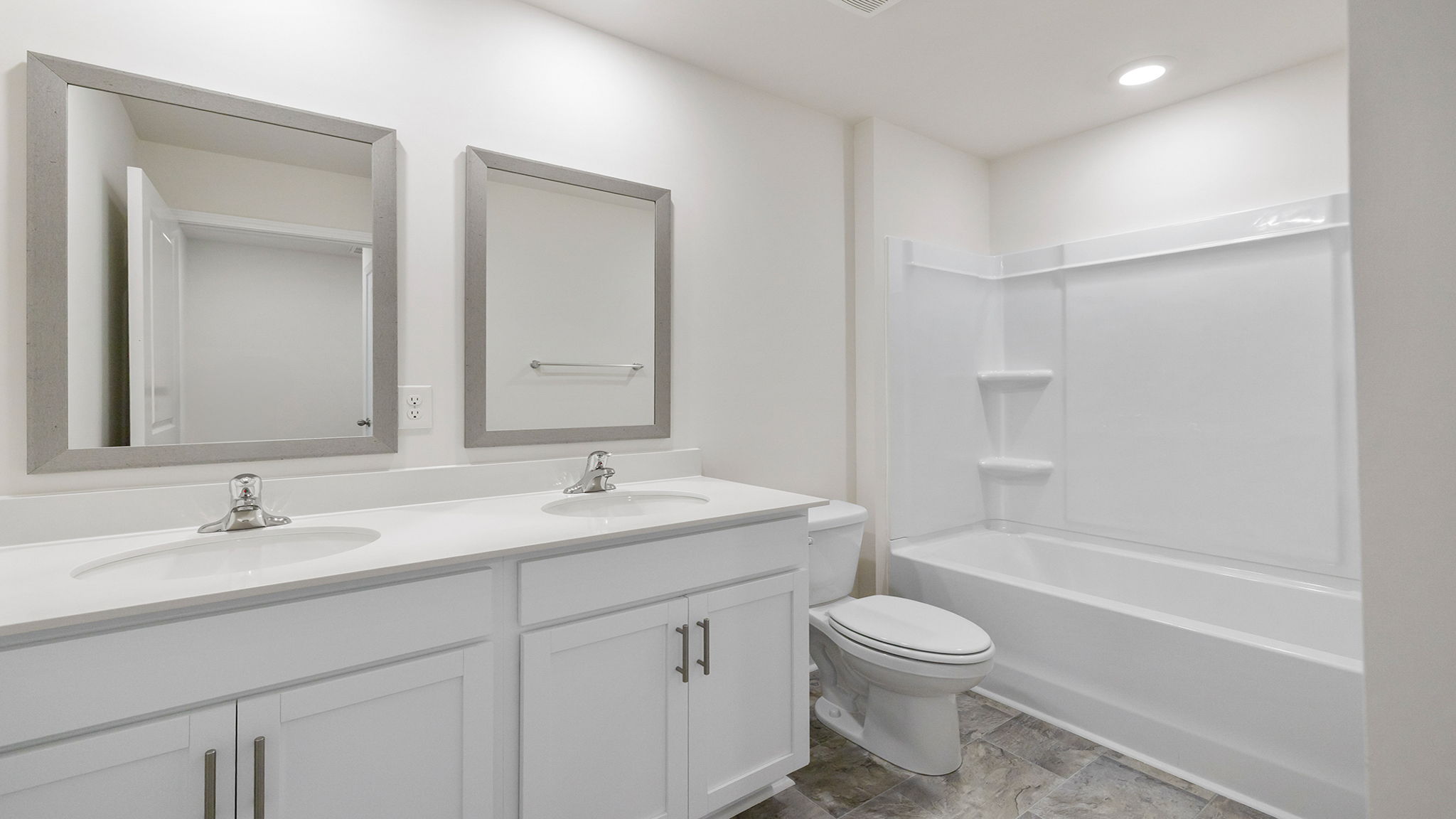 Bathroom with double vanity sinks.
