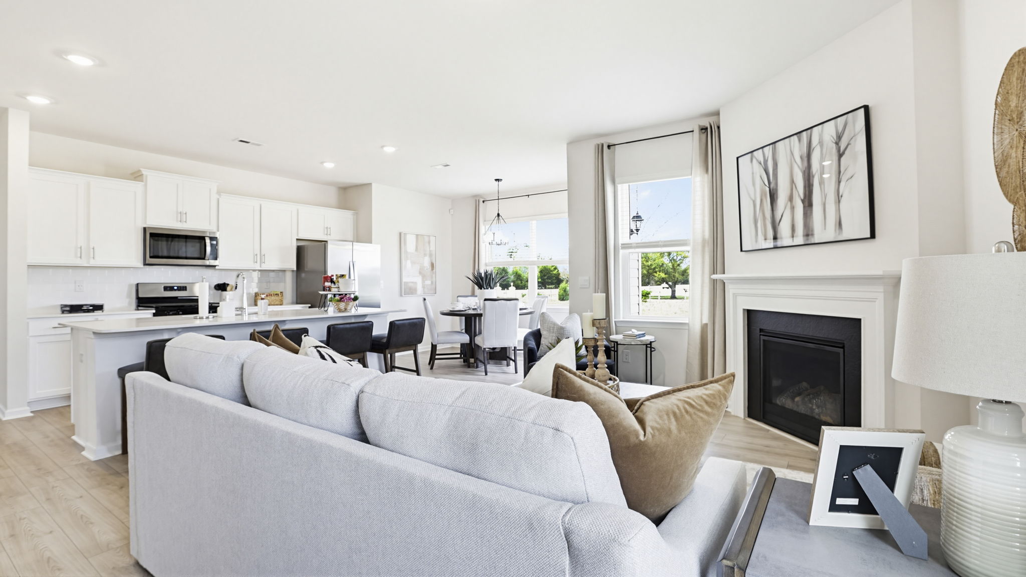 Family room with fireplace and windows.