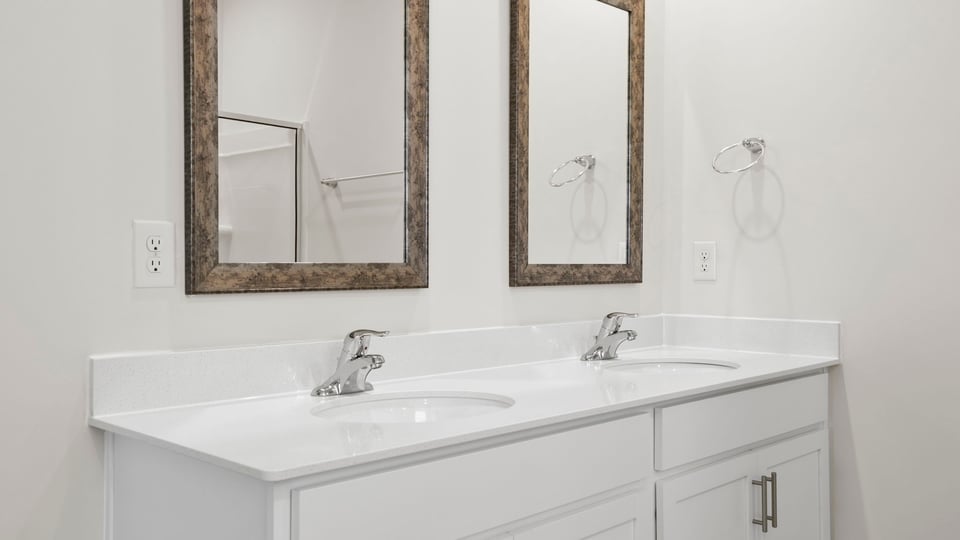 Primary bathroom with vanity sink.