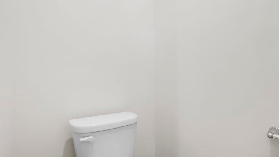 Primary bathroom with double vanity sinks.