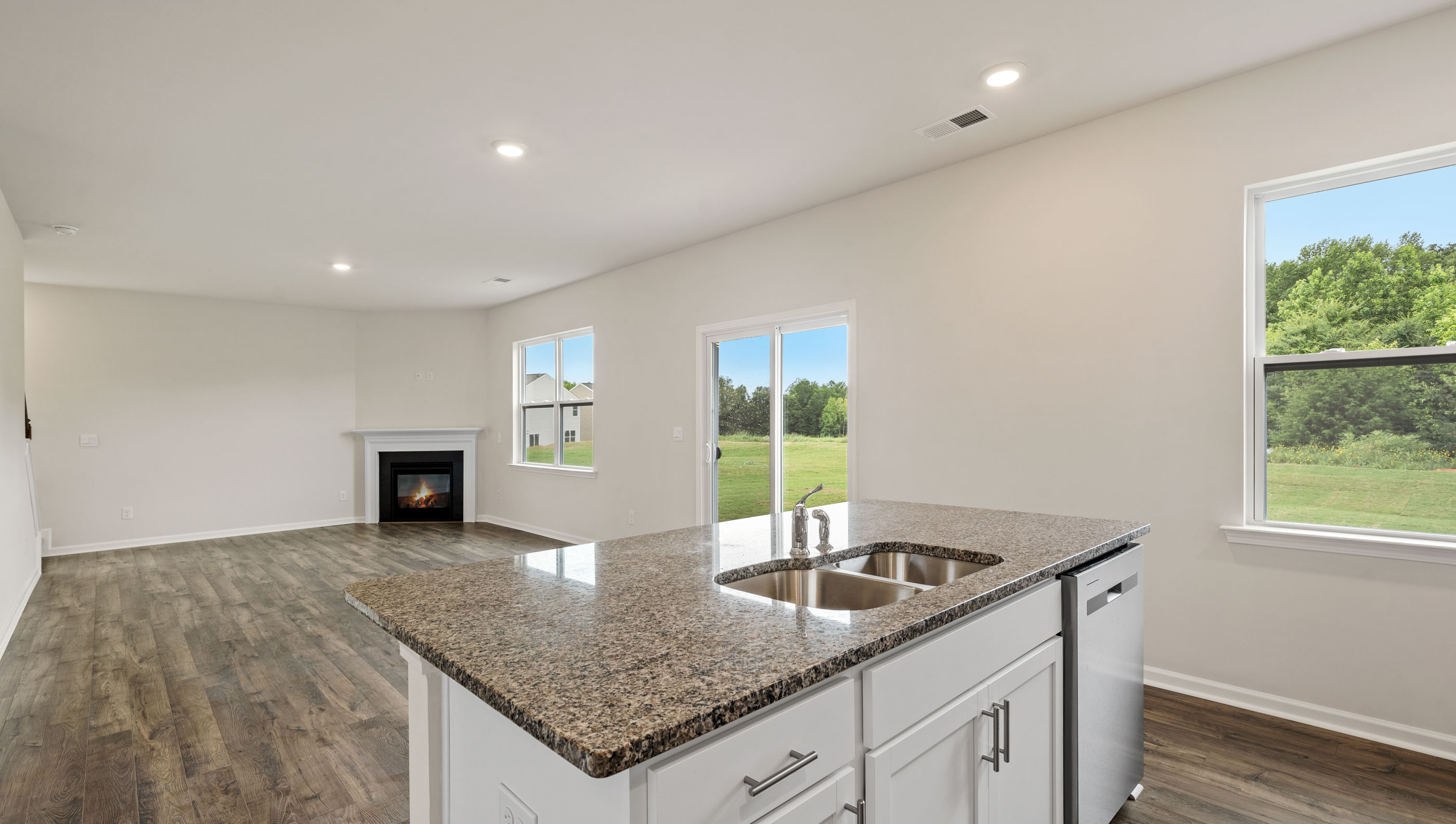 View from kitchen off family room and door to the backyard.