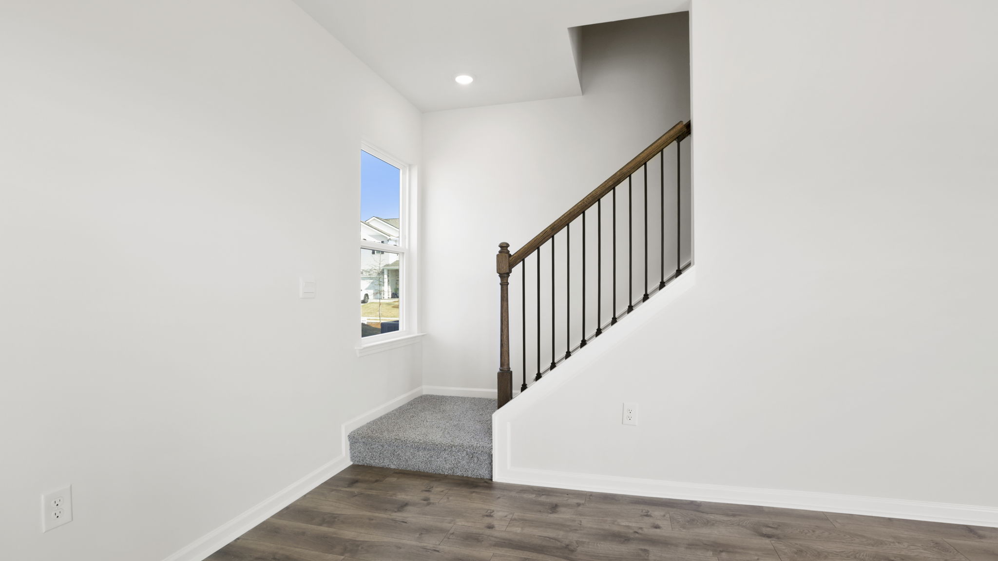 Family room with view of stairs.