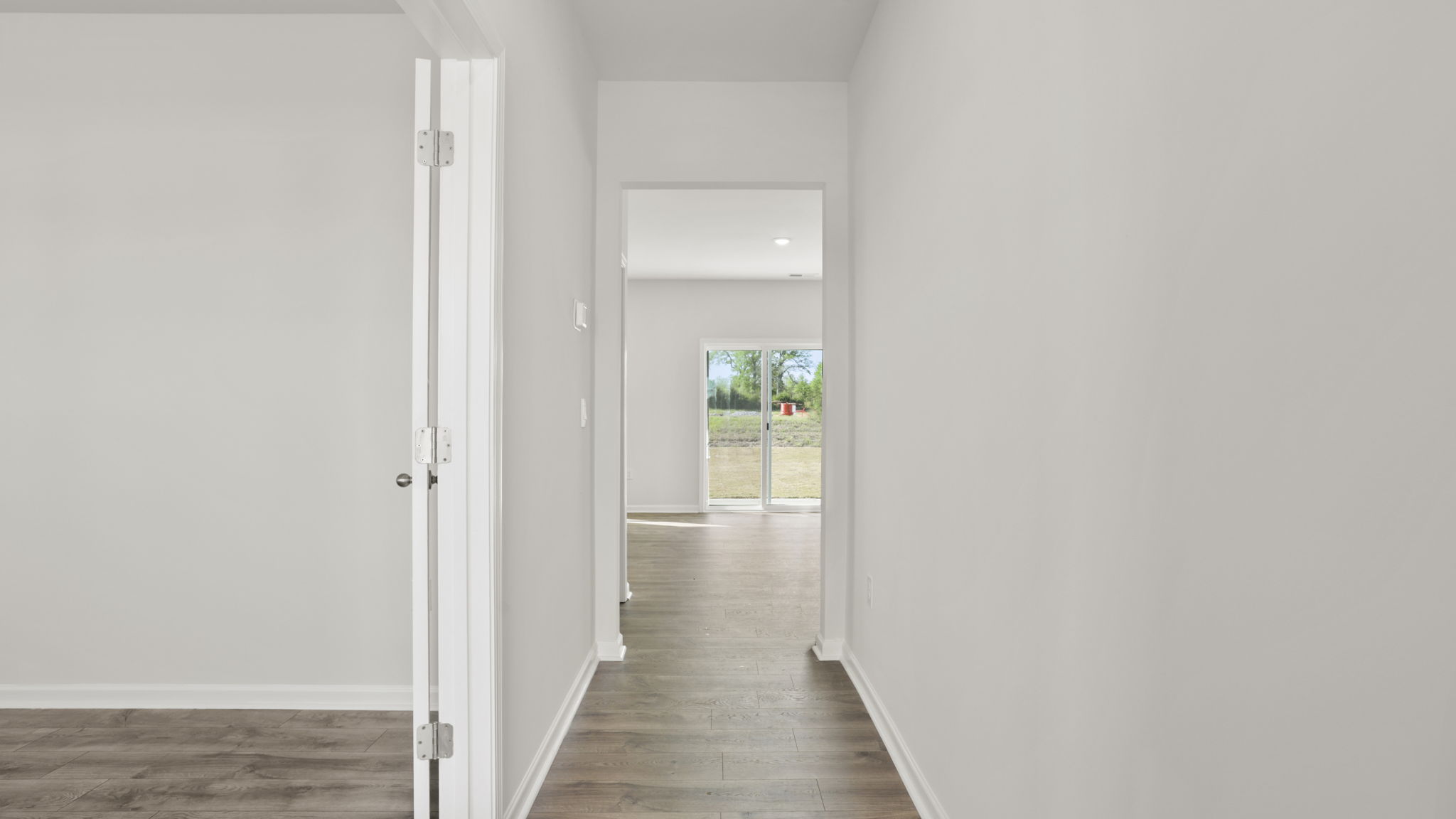 Entry way into home with hallway.