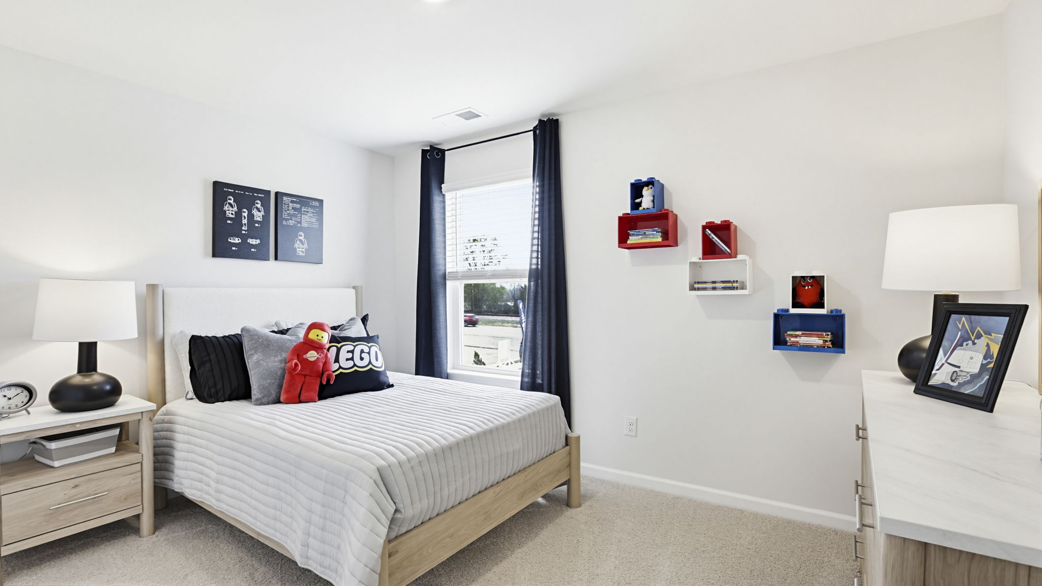 Bedroom with carpet and window.