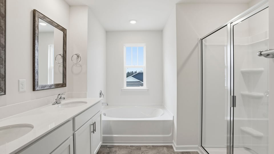Primary bathroom with walk-in shower.  Garden tub is optional.