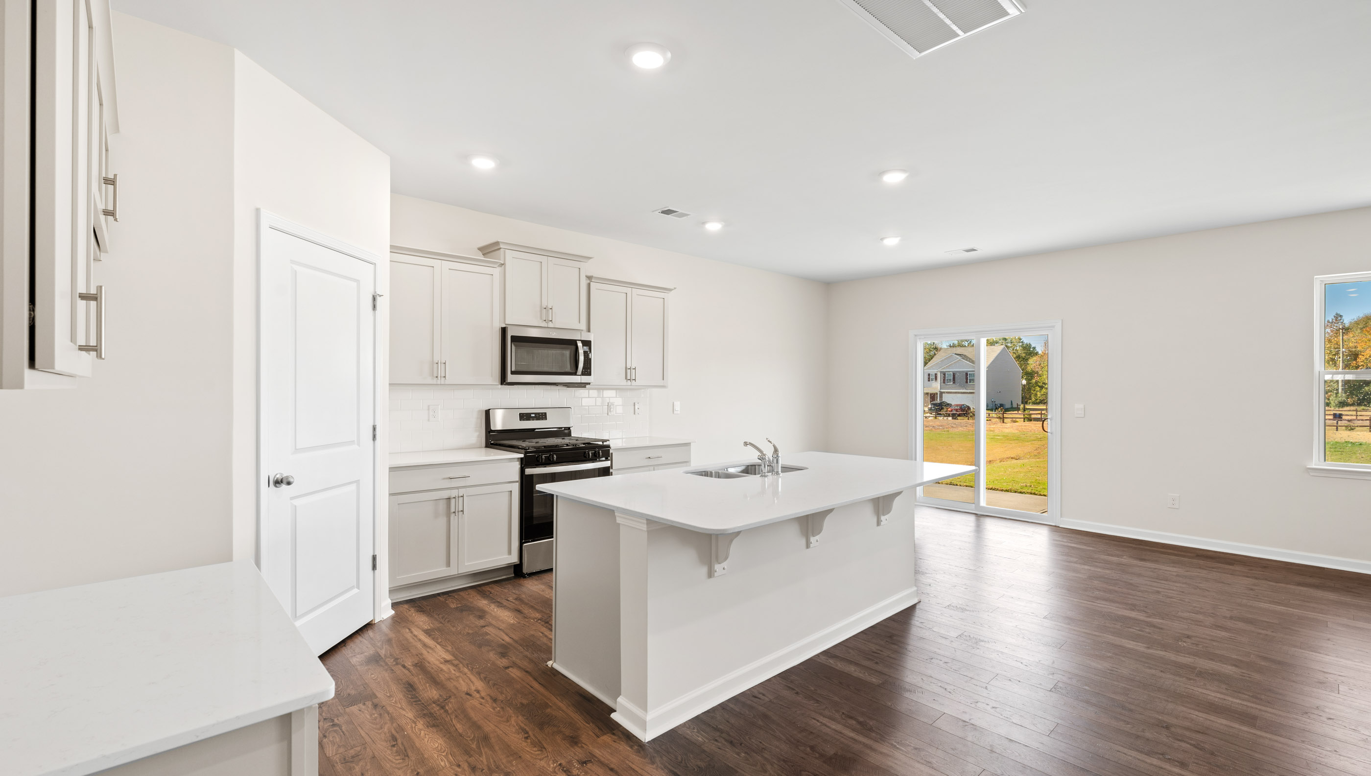 View of kitchen and dining area.