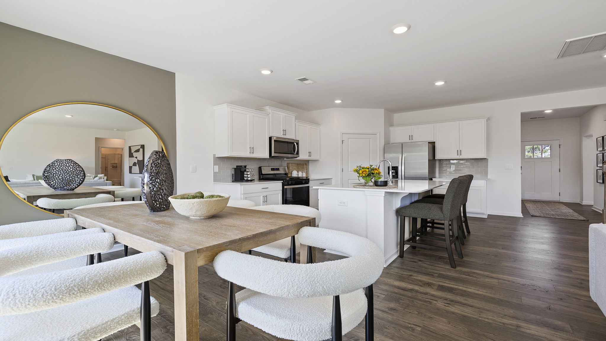 Dining area with view of kitchen.