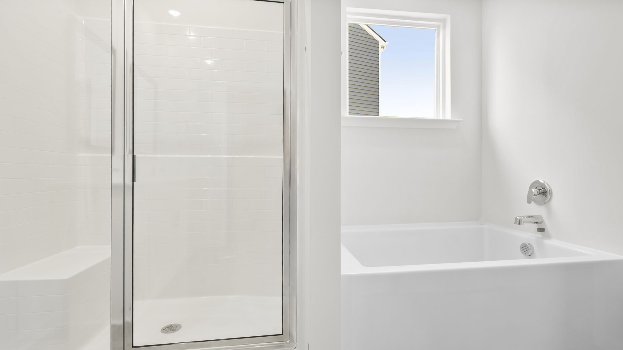 Bathroom with walk in shower.