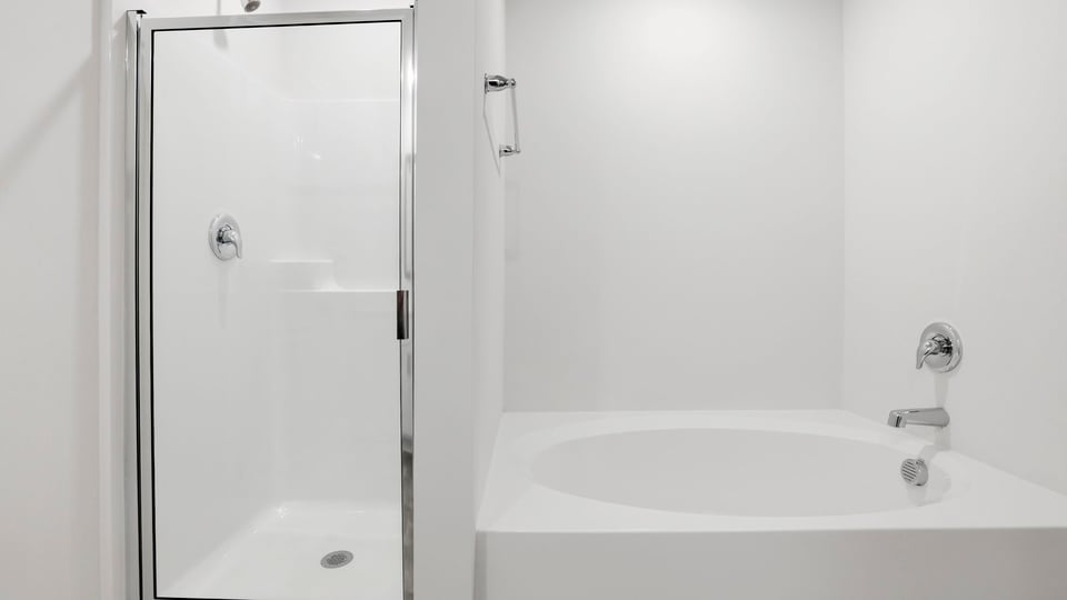 Primary bathroom with double vanity sinks.