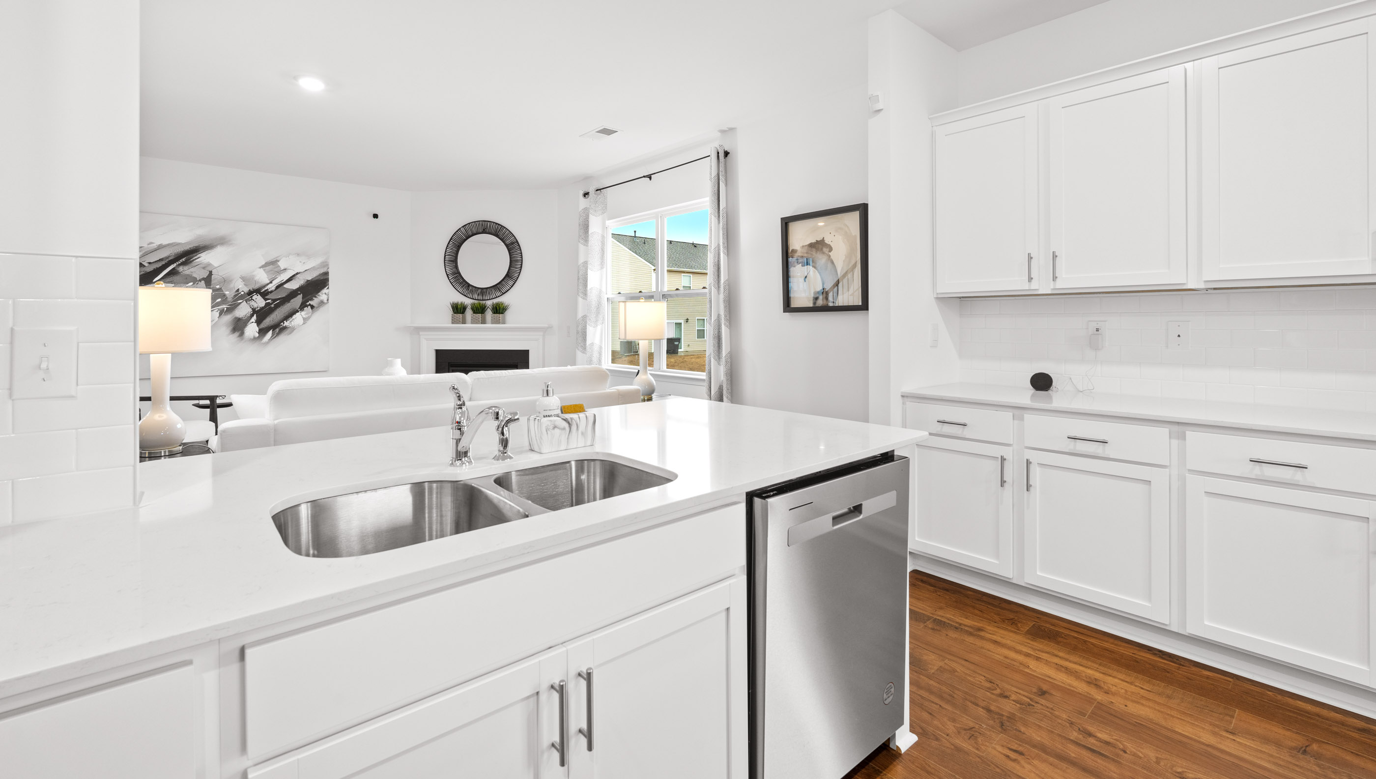 Kitchen with island and cabinets.