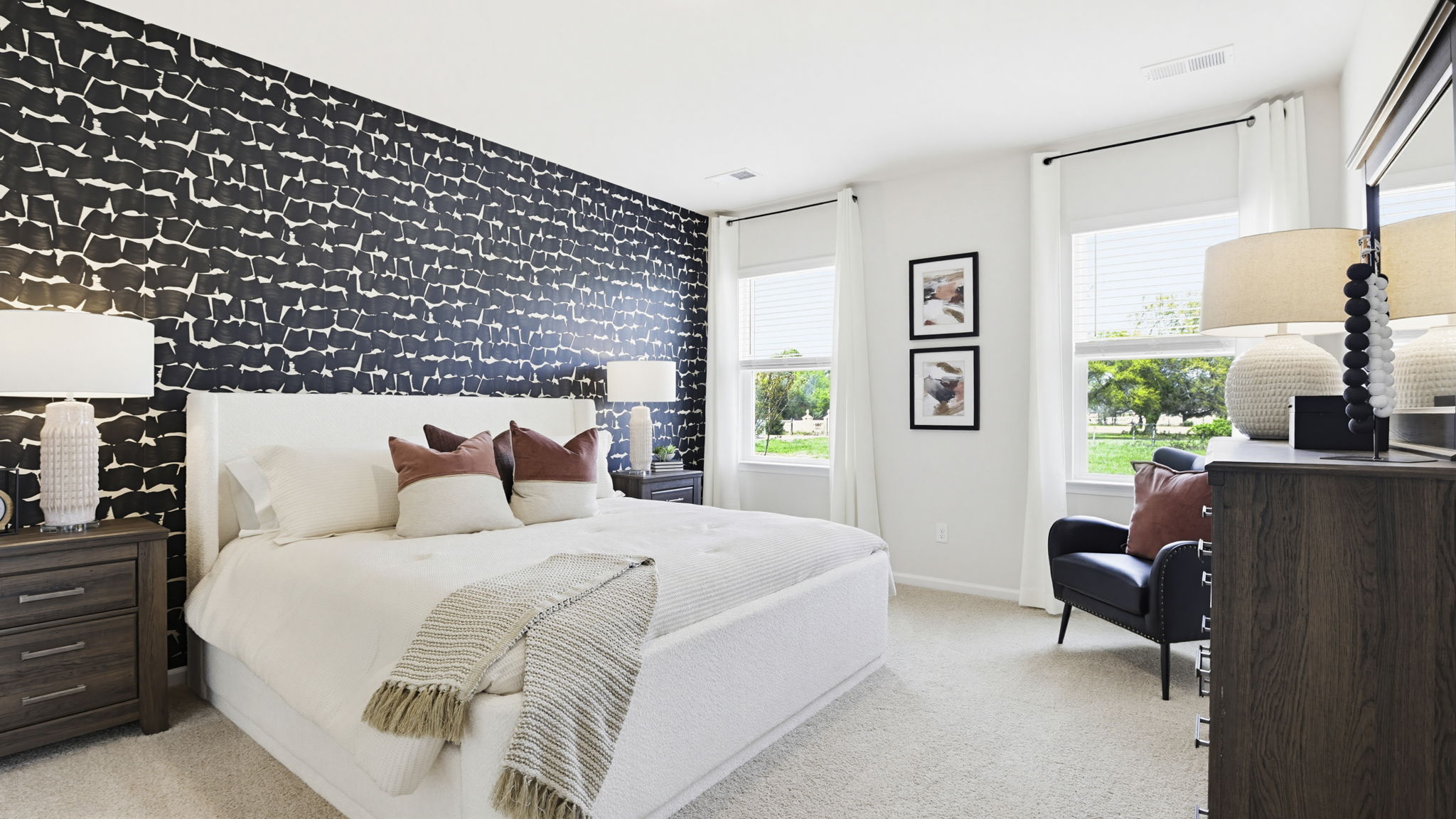 Bedroom with carpet and window.
