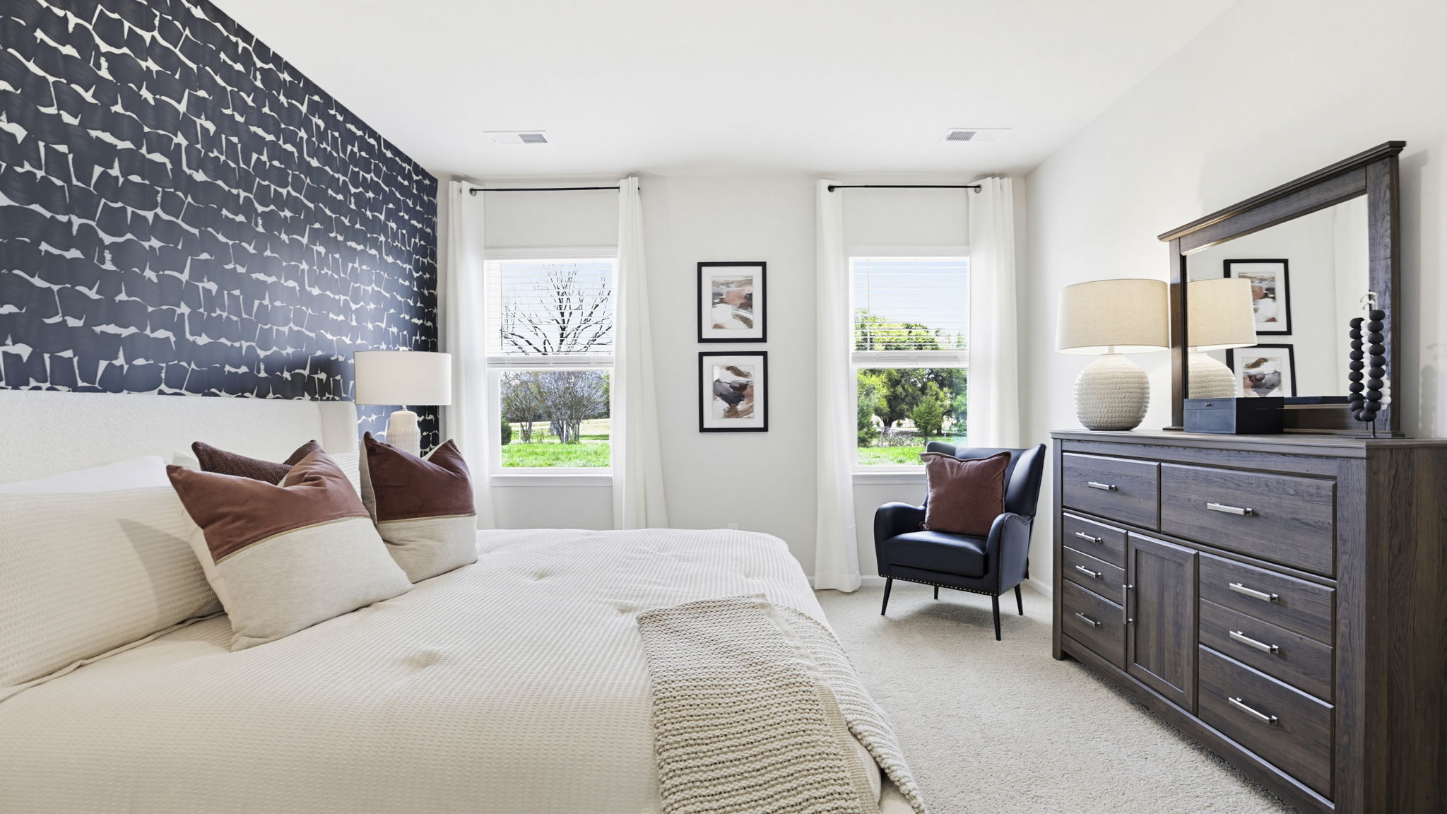 Bedroom with carpet and window.