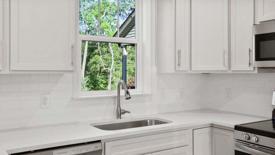 Kitchen with stainless steel appliances.