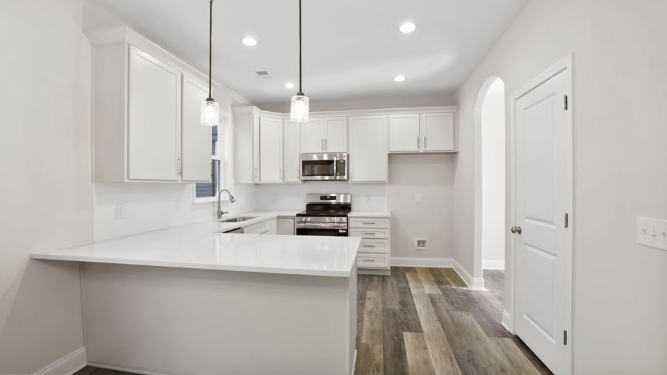 Kitchen with stainless steel appliances.