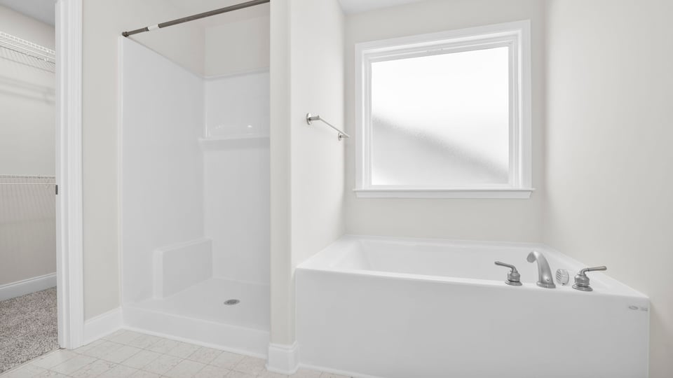 Bathroom with tub and shower.