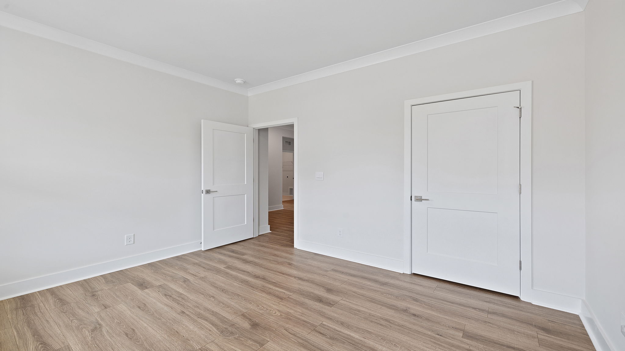Bedroom with window and closet.
