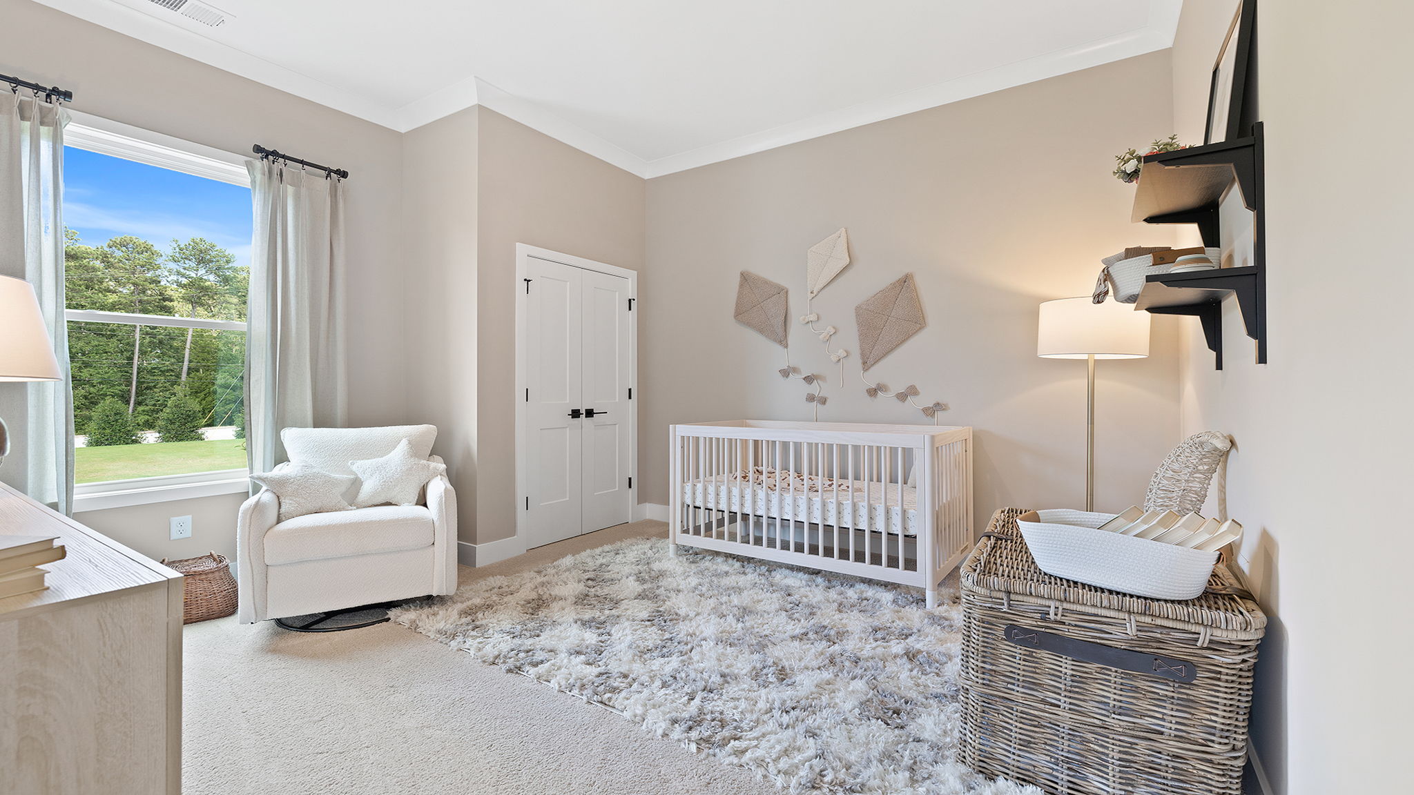 Bedroom with carpet and windows.