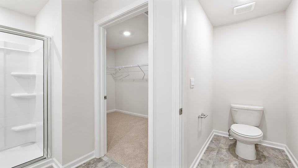 Primary bathroom with double vanity sinks.