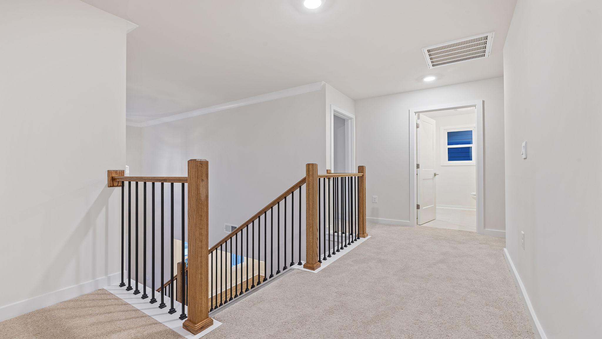 Upper level landing and view of hallway.