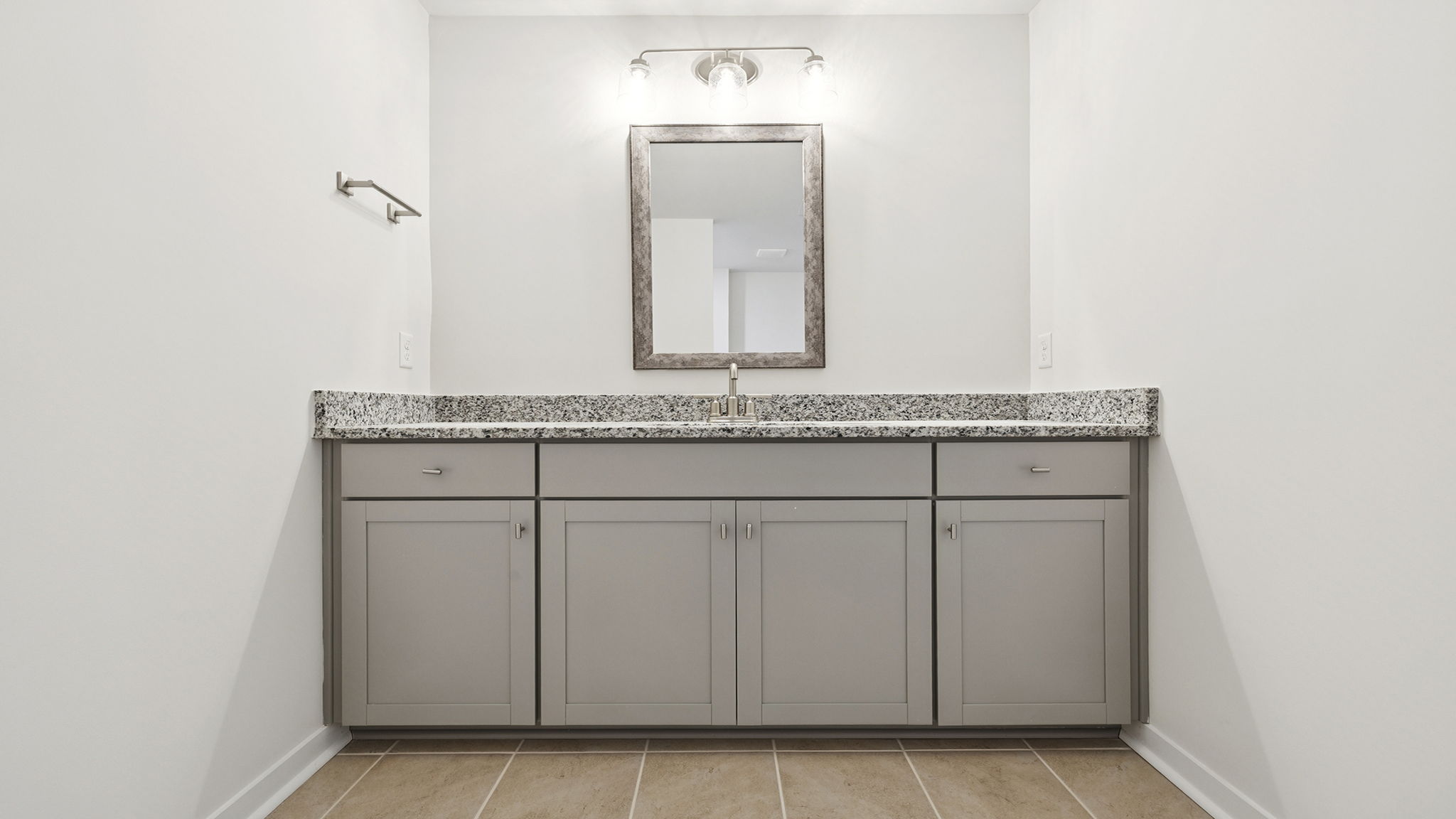 Hall bathroom with large vanity and separate combination shower / tub.