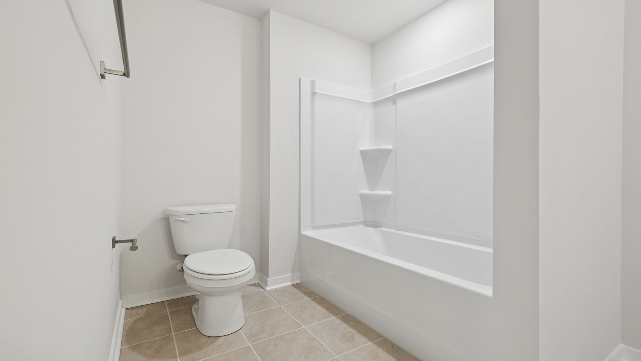 Separate area with combination shower / tub.